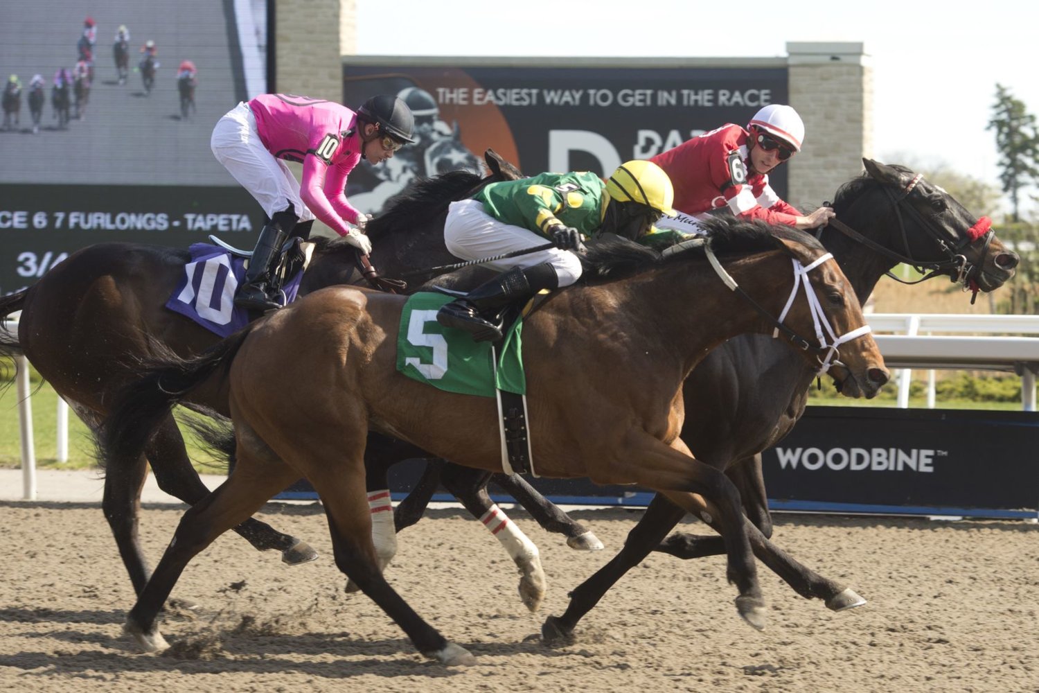 Jockey Ryan Munger winning at Woodbine